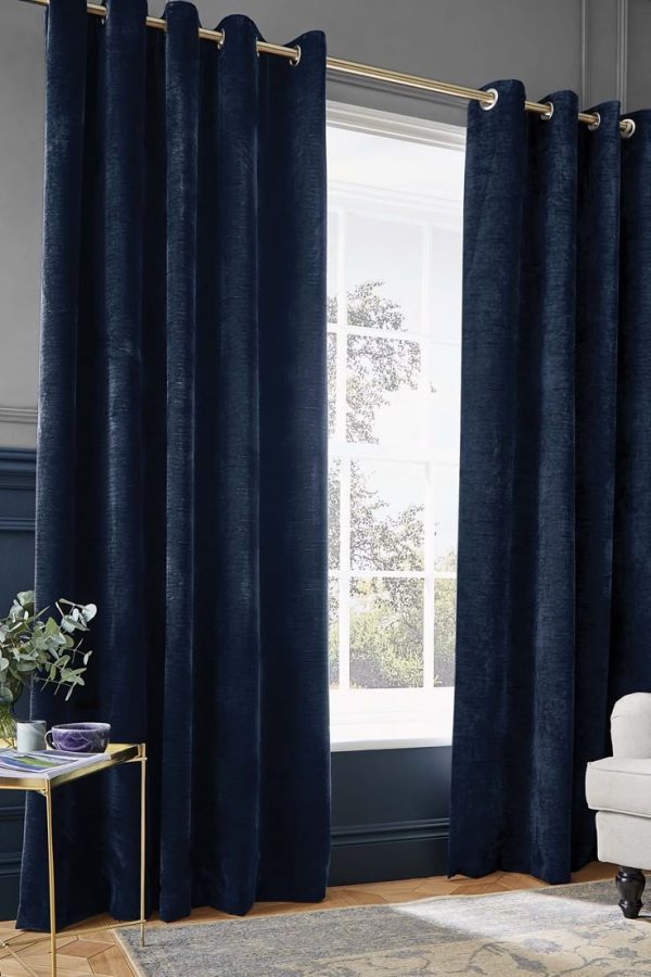 Modern eyelet curtains with smooth sliding rings, stylish look, and durable fabric for perfect home décor.